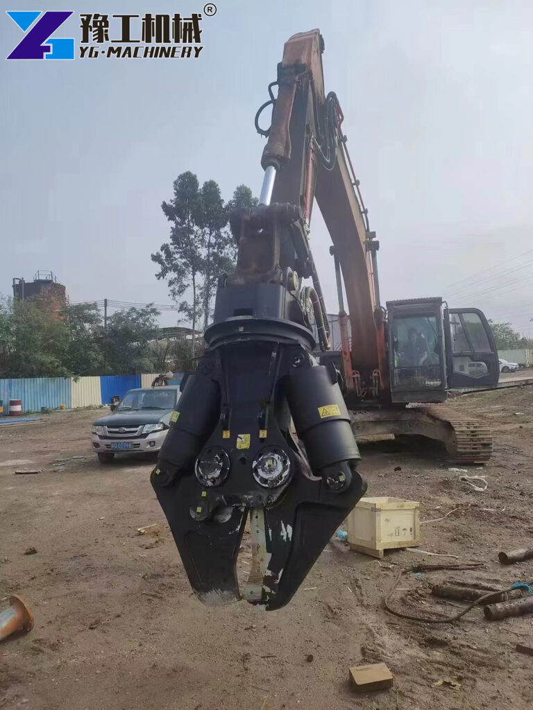 excavator shear working in scrap yard