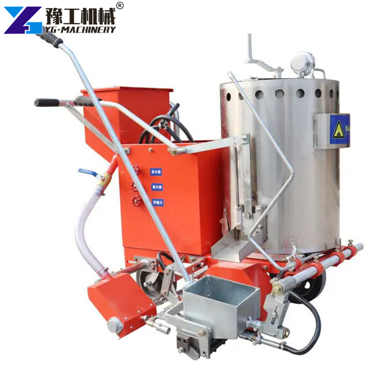 thermoplastic striping machine working on roads