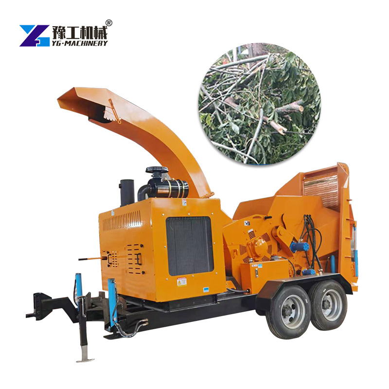 wood chipper reducing branches into mulch