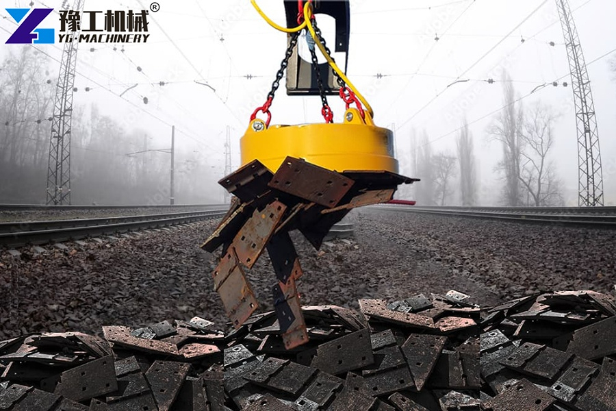 Excavator Magnet Lifting Scrap Steel At Demolition Site